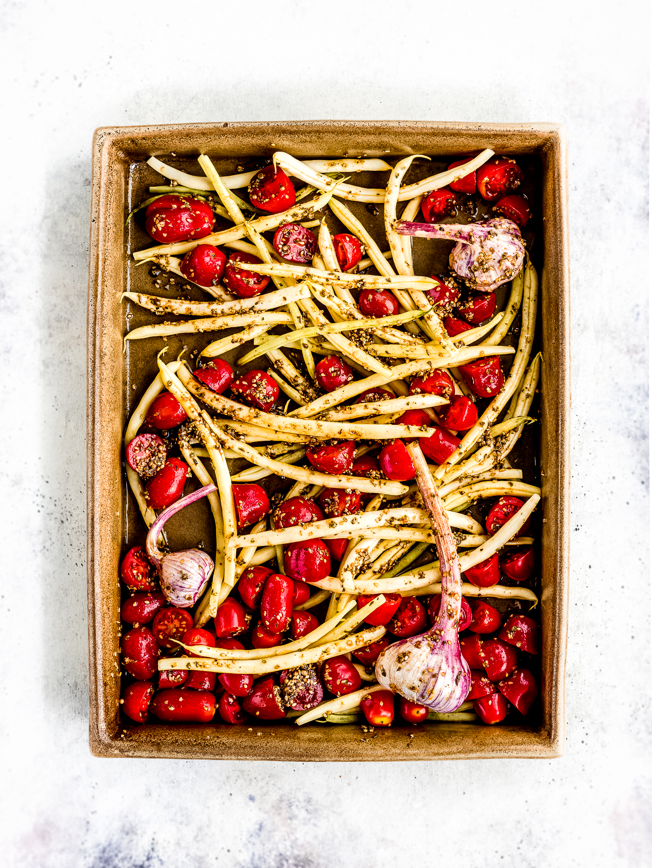 arrosto di fagiolini, pomodorini e aglio fresco