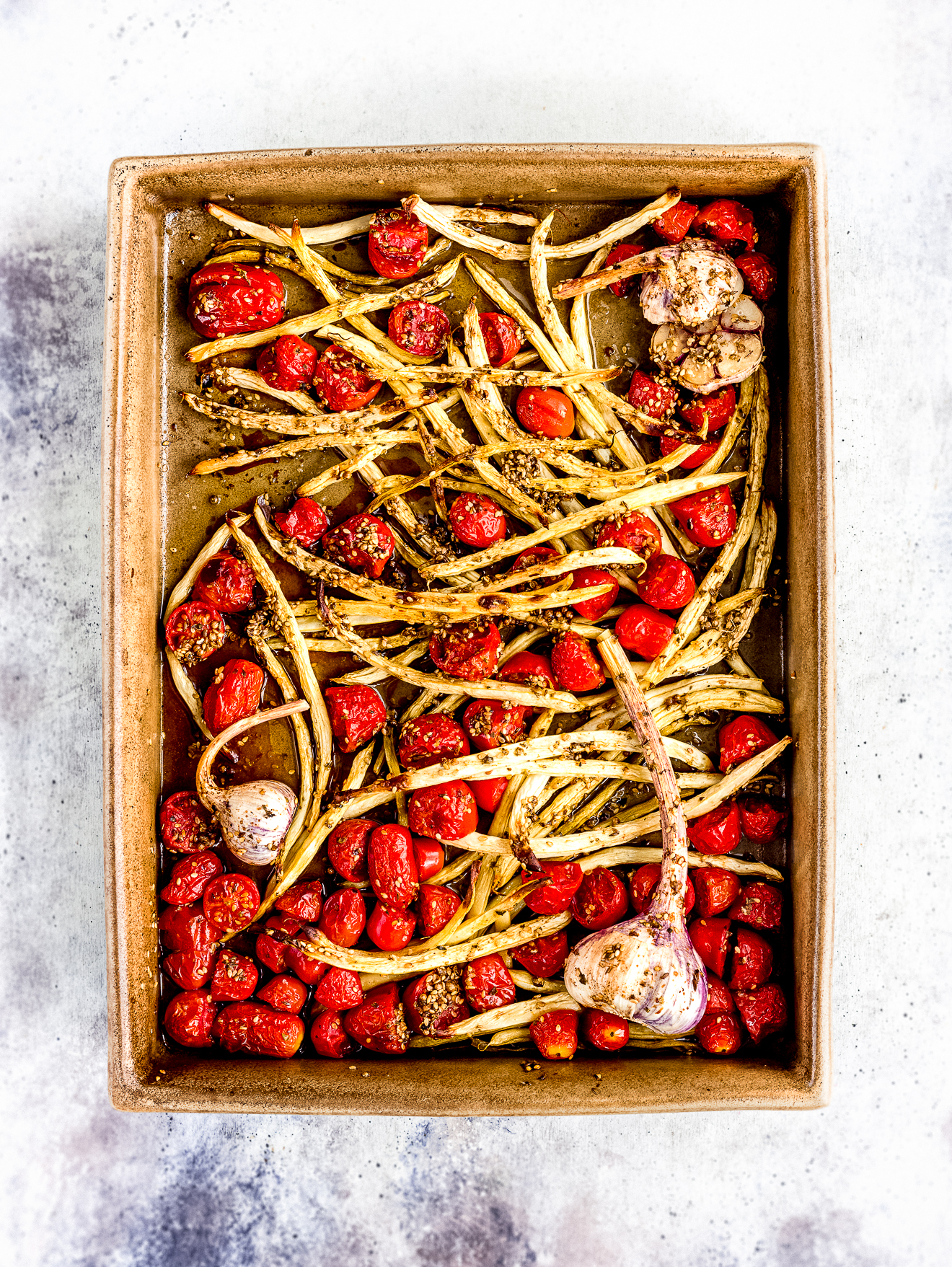 arrosto di fagiolini, pomodorini e aglio fresco